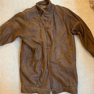Vintage oversized Brown Leather Jacket with zip-out fleece vest liner.
